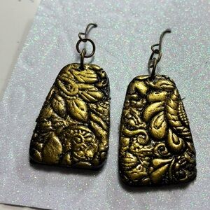 Elegant Gold and Black Embossed Earrings